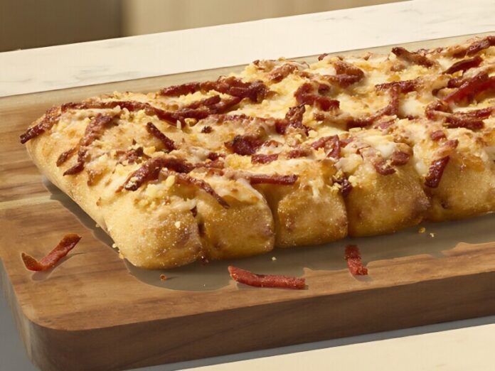 Marcos_Pizza_Pepperoni_Bread This tasty side features crispy shredded pepperoni layered underneath three fresh cheeses, and finished with garlic sauce and Marco’s signature Romesan seasoning.